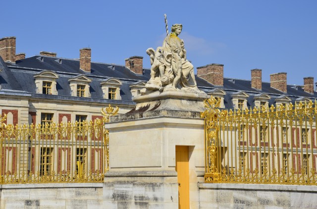 Art oozing  out of every nook and cranny. One of the statue in massive courtyard of palace. 